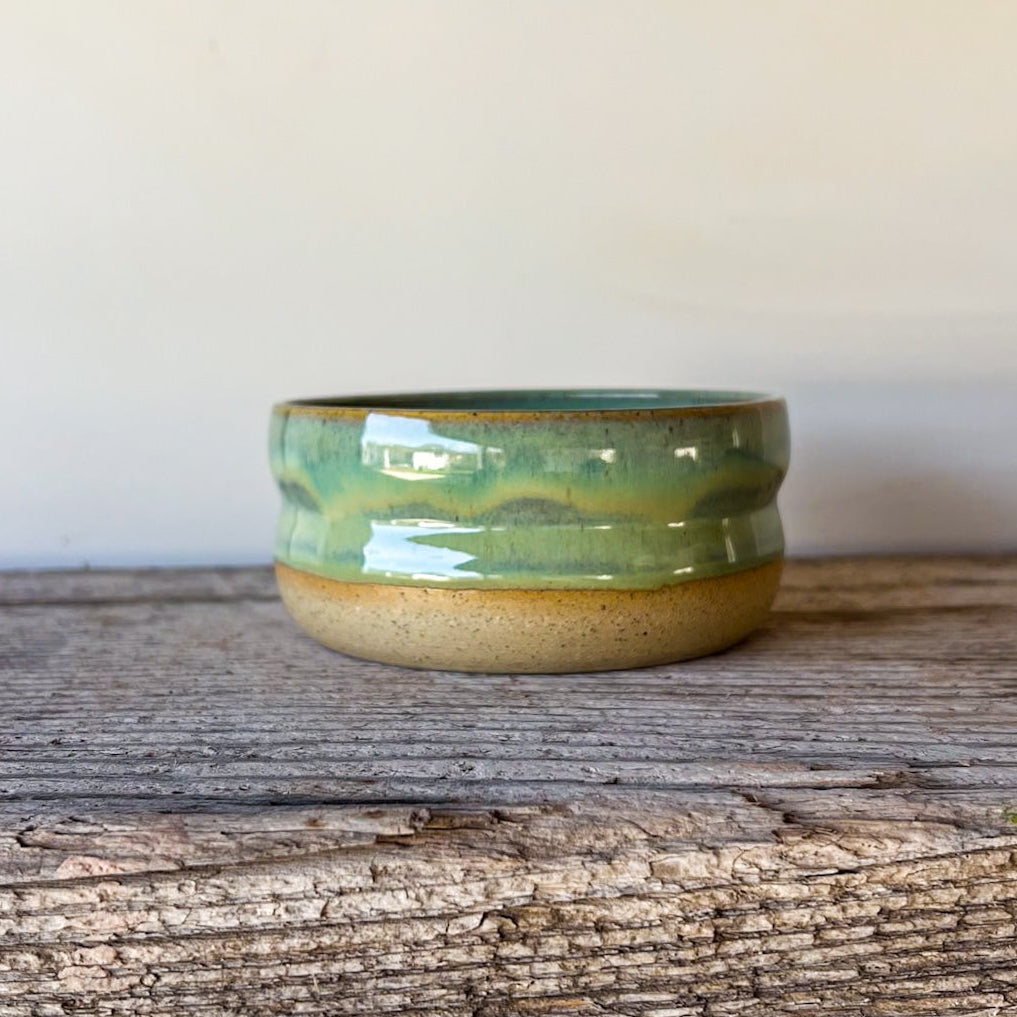 Green ceramic bowl